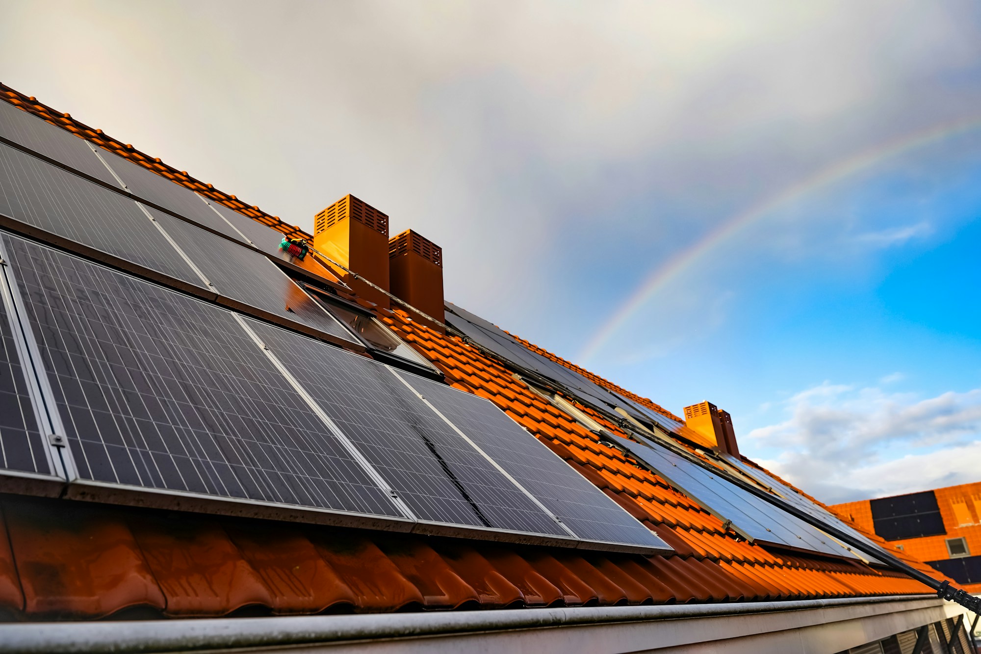 Rooftop solar panels under an open sky